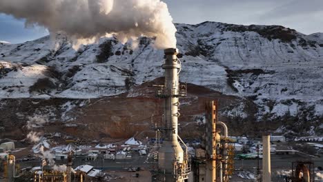 industrial plant in snowy mountains