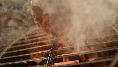 cooking a delicious hamburger on a grill