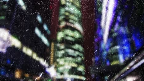 night city through wet glass