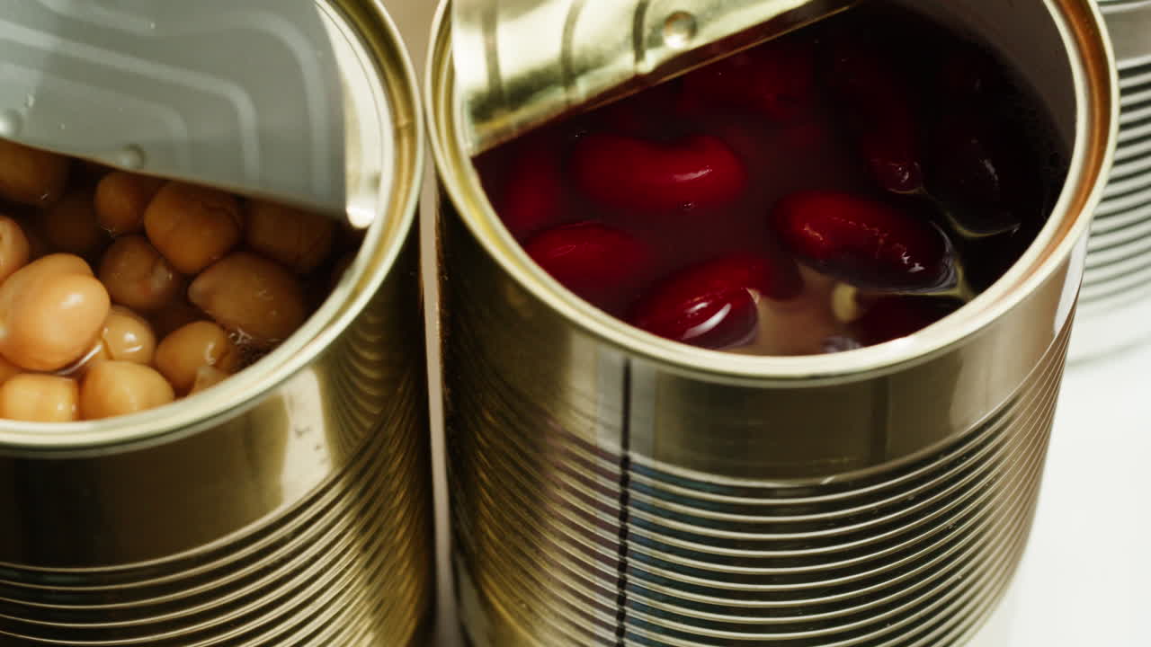 Canned red bans preserved beans rotating background close up side view. Organic steamed beans. Pickled bean for a Mexican dish