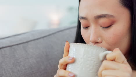 coffee, thinking and woman on the sofa to relax