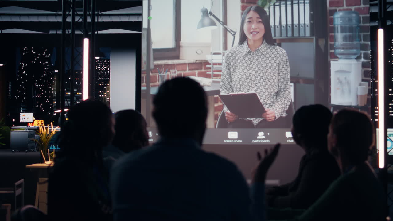 Diverse company staff joining a video call online with the CEO late at night