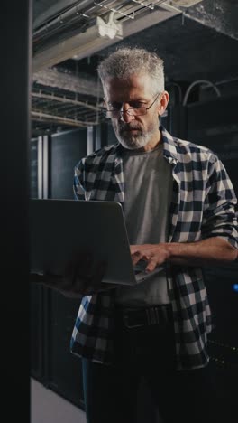 it technician working in a server room