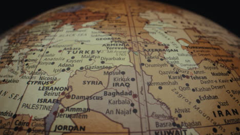close-up of a world globe focusing on the middle east