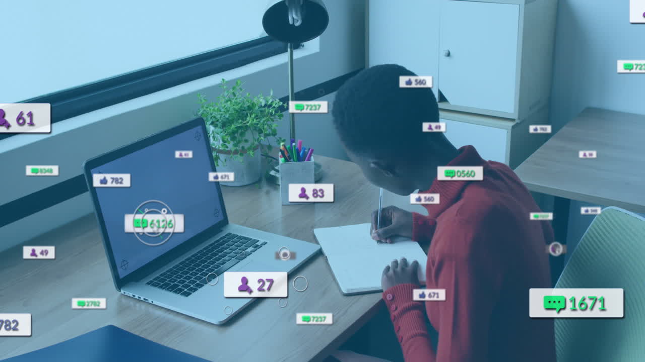 Woman writing notes at desk, showing floating social media icons for marketing analytics