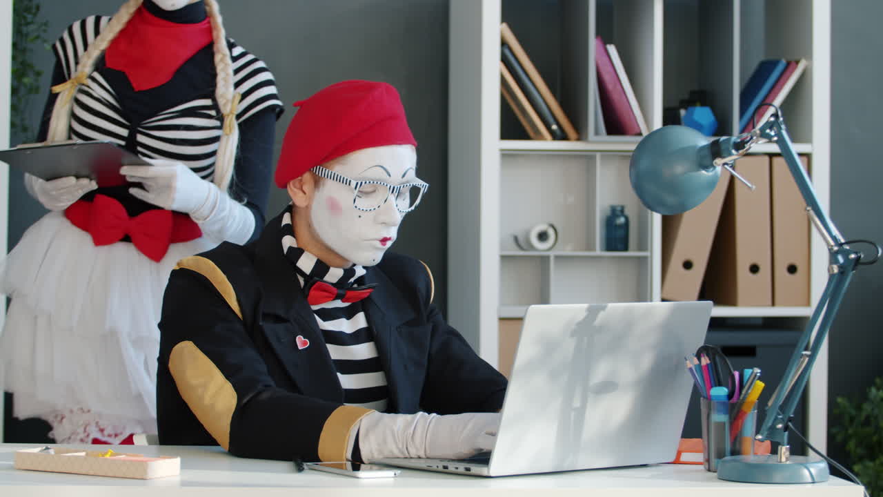 Mime Employees in an Office Setting