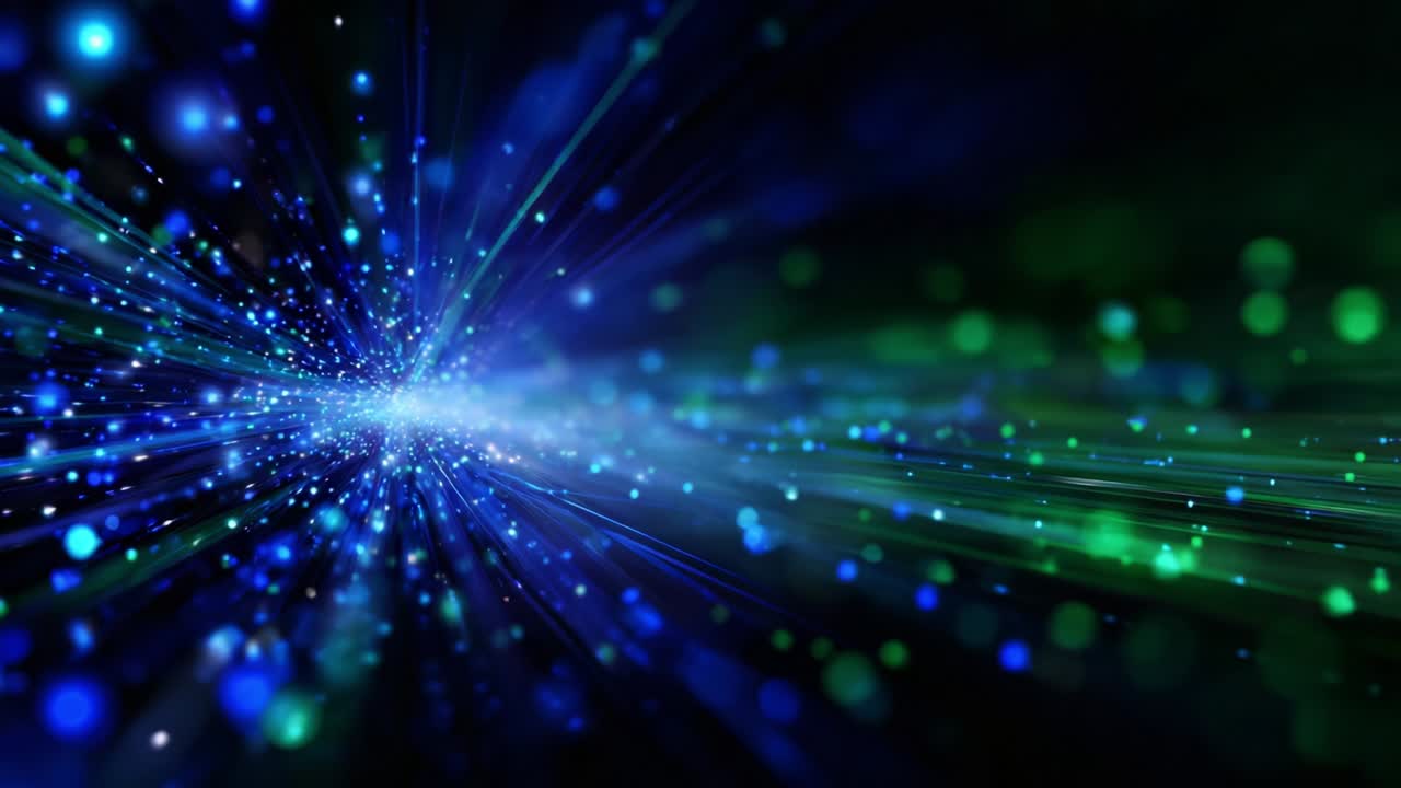 Dynamic Burst of Blue and Green Light Particles Creating a Vivid, Abstract Background Ideal for Visual Effects, Technology Themes, or Digital Art Representations of Movement and Energy in a Stunning Display