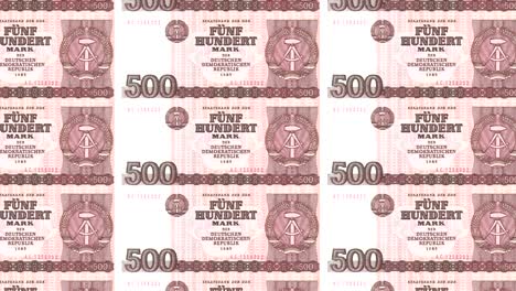 banknotes of five hundred german marks or deutschmarks of the bank of the old german republic rolling on screen, coins of the world, cash money, loop