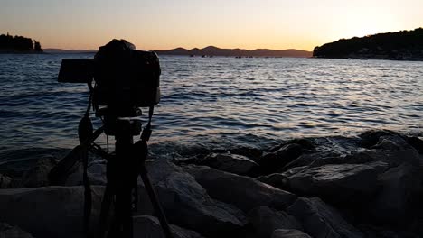 making timelaps with professional camera at sunrise