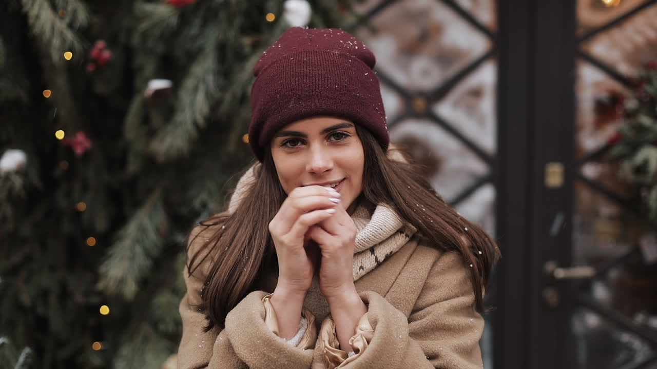 Woman in Winter Coat and Hat Outdoors