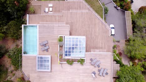 luxurious villa with rooftop pool and glass skylights - top view