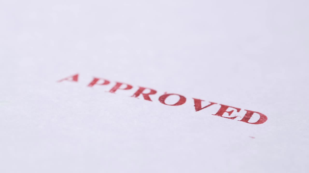 Stamping Document with Approving Contract close up