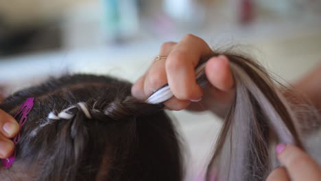 braiding a child's hair