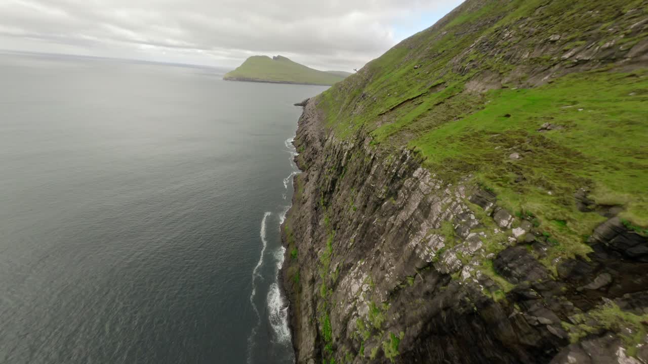 A breathtaking cliffside view over the ocean in the Faroe Islands, serene and wild