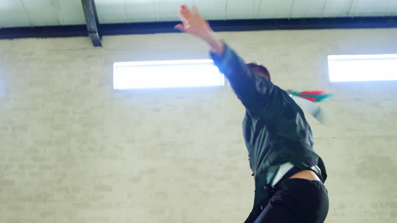 Kung fu fighter practicing martial arts with sword 4k