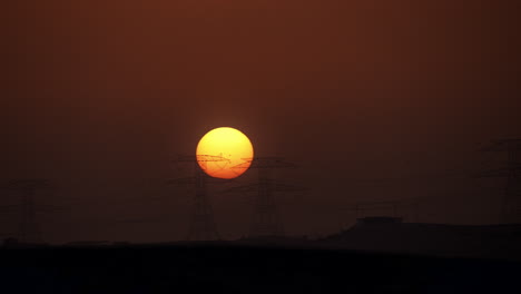 sunset over power lines