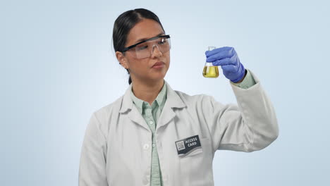 studio, woman or scientist with solution in glass