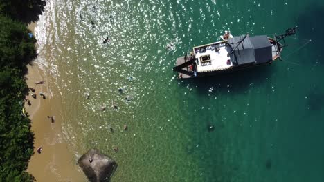 Pirate-ship-set-anchor-off-Coast-of-Island-in-Crystal-Clear-Water-in-a-Tropical-Brazilian-Ocean