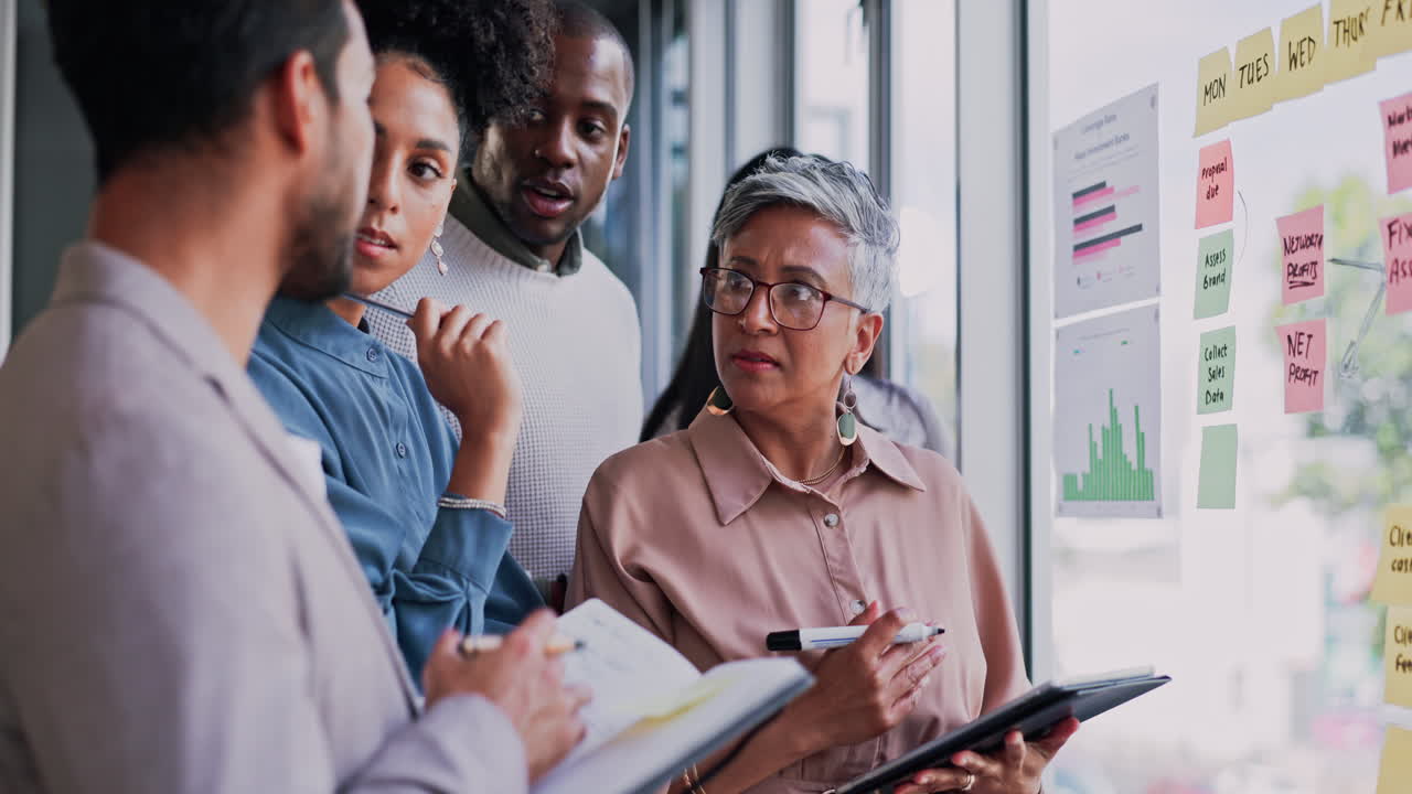 Writing, glass planning and business people