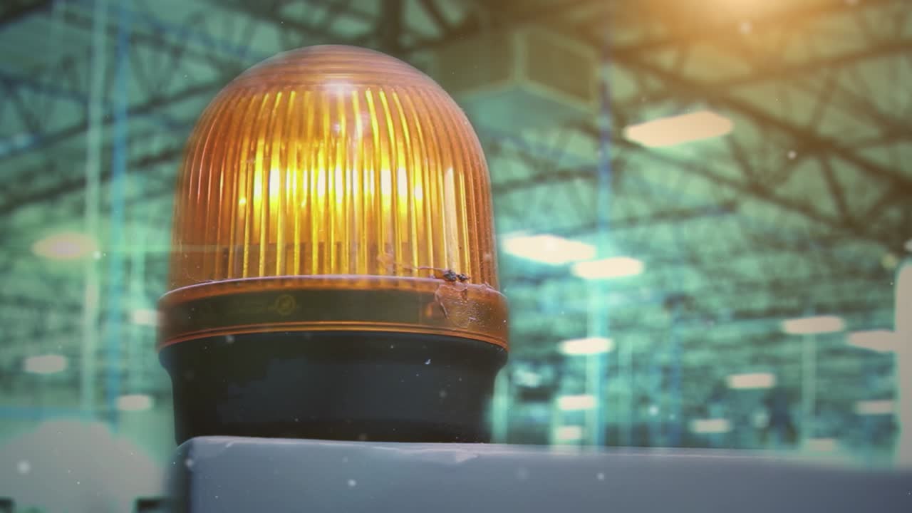 Yellow Warning Light at Factory. Close Up. Zoom Out. 4K Resolution.