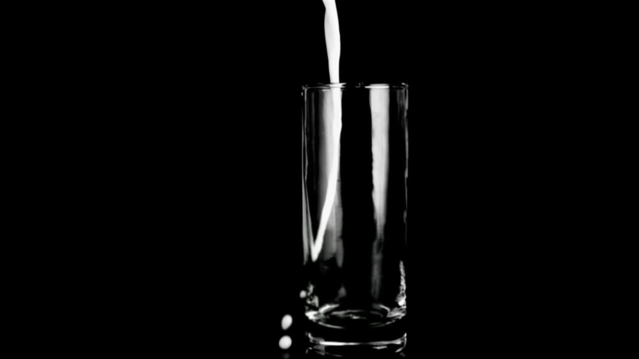 Milk been poured in super slow motion