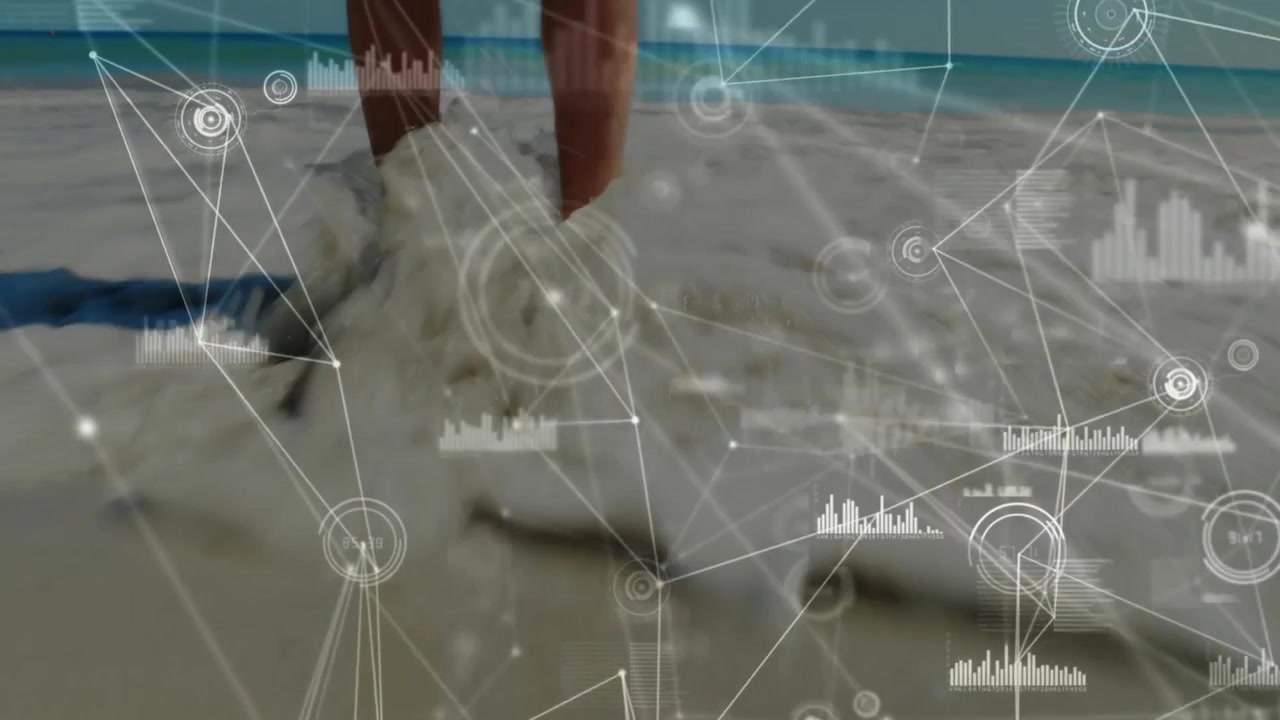 When digital network graphics overlaying feet, woman stepping into surf illustrating data flow