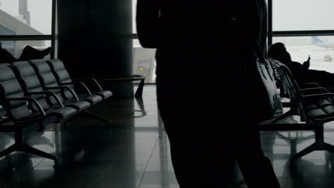 passengers waiting in lounge of airport