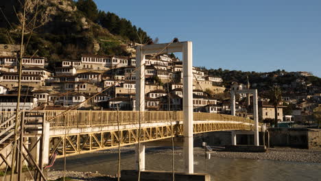 Historical-Gorica-Bridge-and-Ottoman-House-background,-Berat,-Albania,-Establishing-shot