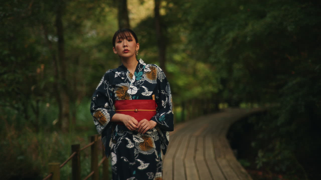 Woman in Kimono on Forest Path