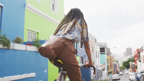 mixed race man on his bike