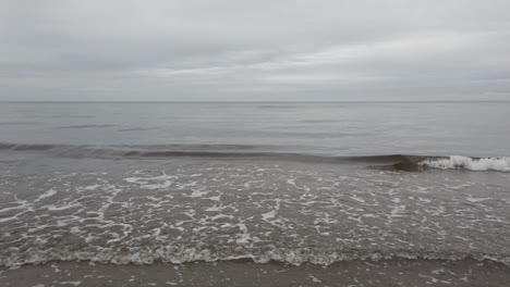 infinite, wide sea on cloudy day, pedestal up shot