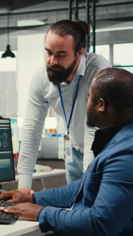 vertical video administrator and assistant gather data from monthly reports
