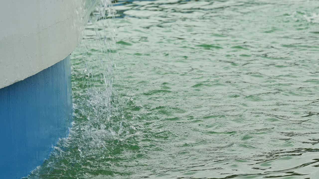 Slow motion footage of fountain pool water in 4K