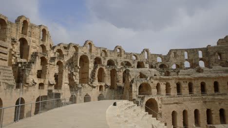 preserved famous landmark of the el jem amphitheatre in tunisia - panning shot