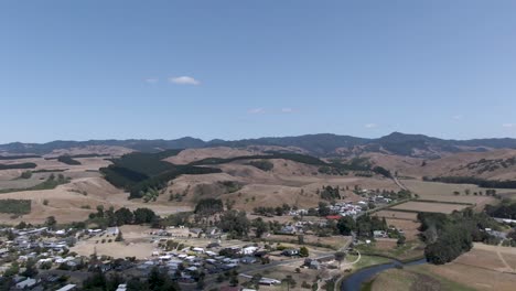 small town riversdale in new zealand - aerial drone pull away view