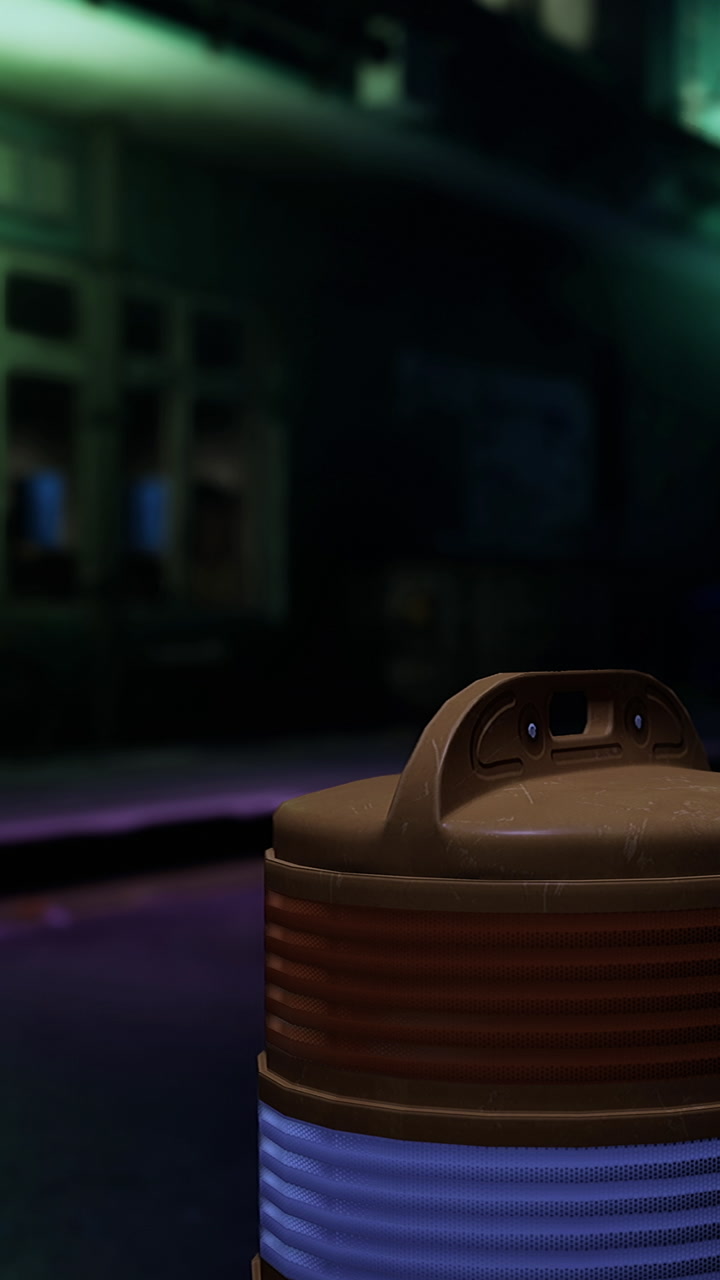 Lid on a container with urban lights in the background at night