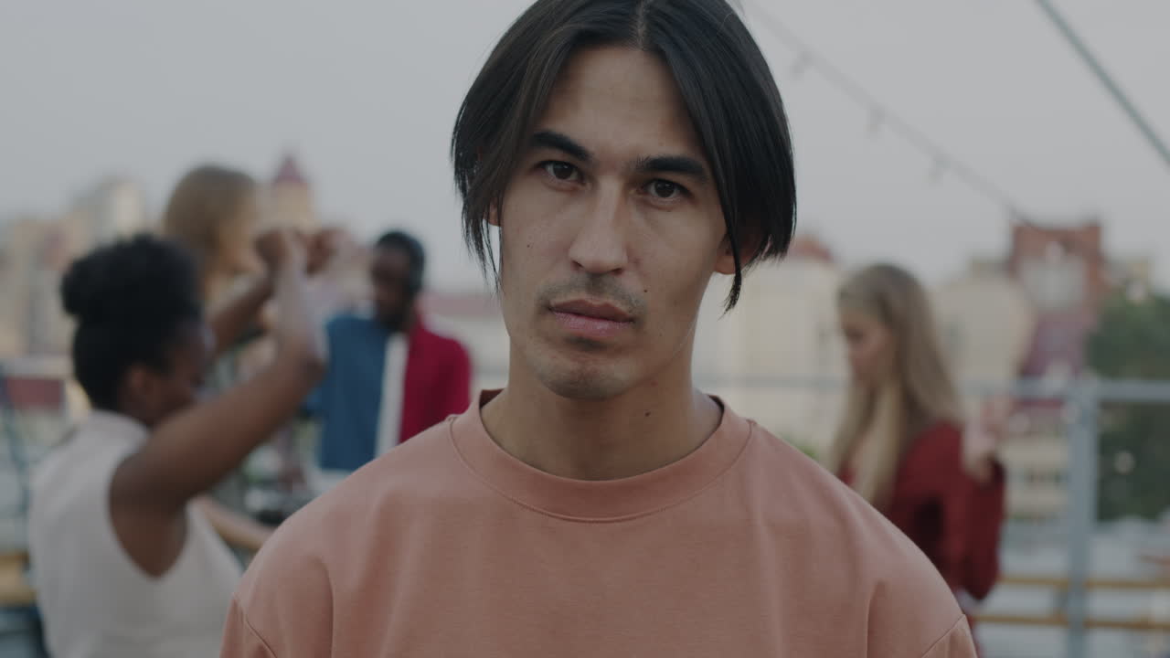 Man at a Rooftop Party