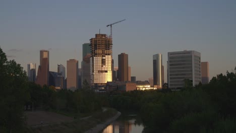 establishing shot of downtown houston in the evening