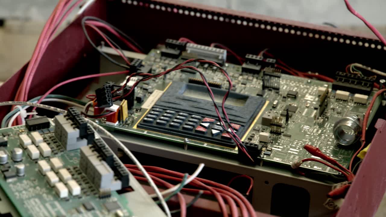 Construction site dolly right to left of the inside of a machine