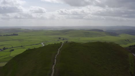 drone shot orbiting mam tor 01