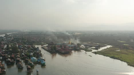 Aerial-at-Alodaw-Pauk-Pagoda-at-shore-of-Nampan-village-at-Inle-Lake