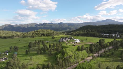 amazing aerial birds eye of picturesque greystone castle in nature, mountain landscape, colorado, usa