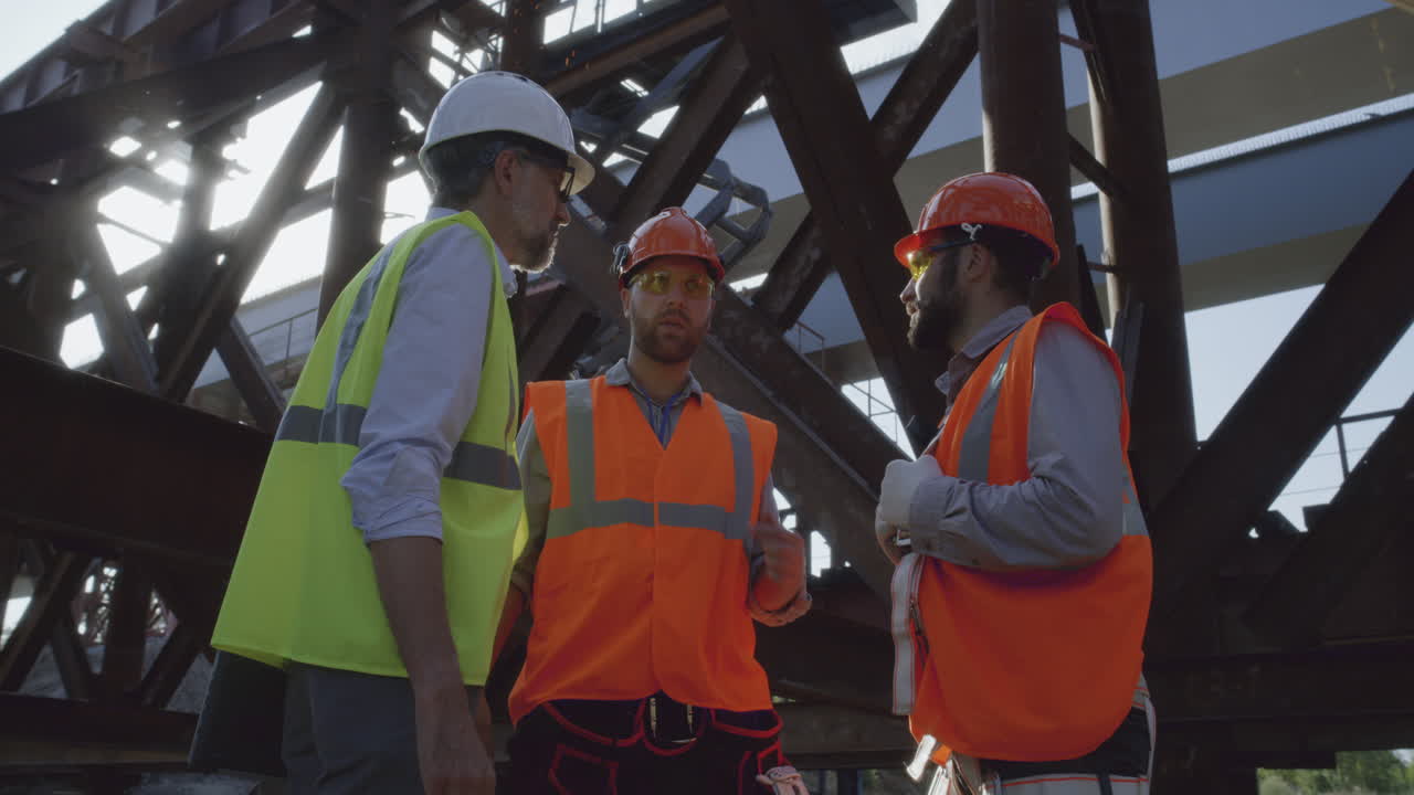 Construction Team Discussing Bridge Project