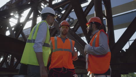 construction team discussing bridge project