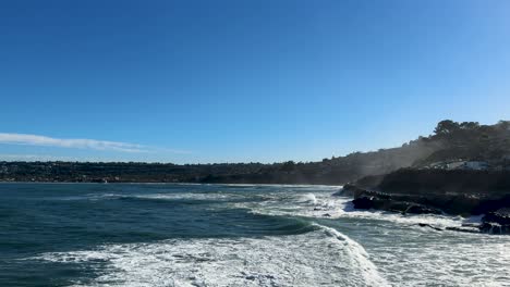 4K-slow-motion-footage-of-large-ocean-waves-crashing-on-cliffs-during-high-tide-in-La-Jolla-Cove,-San-Diego-California