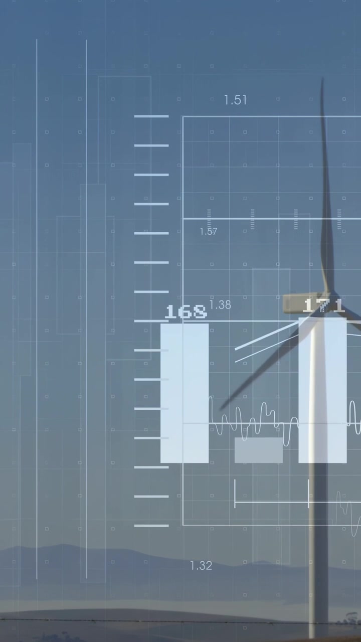 Vertical video: Wind turbine rotating, transparent bar chart updating live data tracking energy