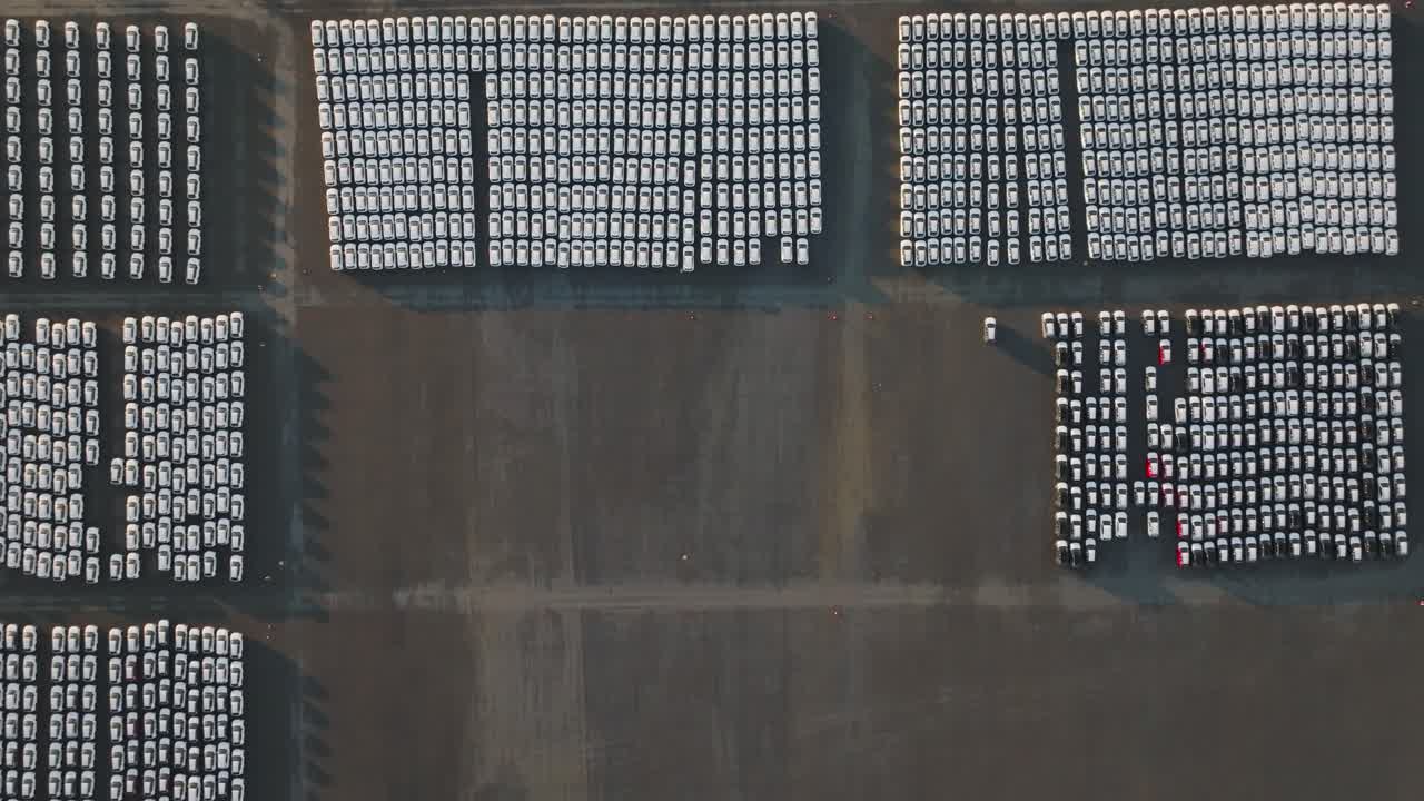 Aerial top down - empty spot at manufacturing company parking lot