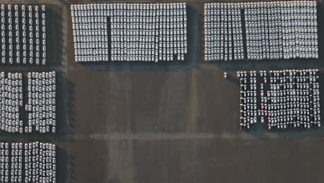 aerial top down - empty spot at manufacturing company parking lot