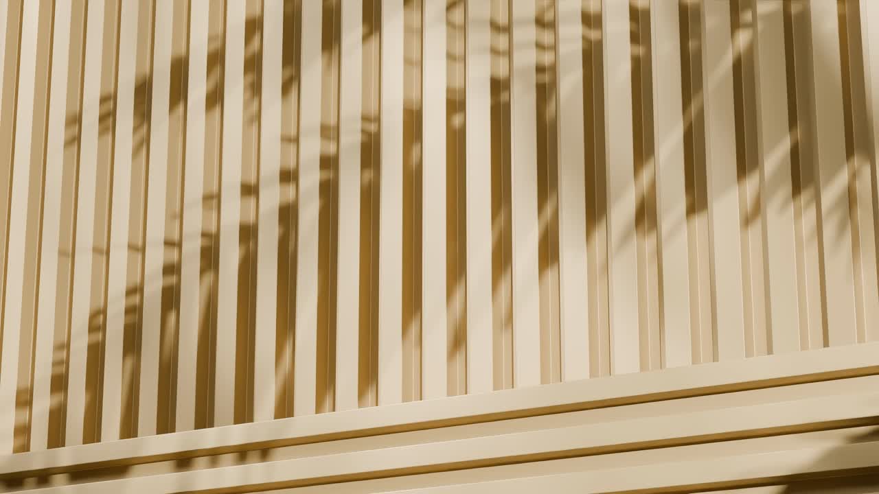 orange yellow metal panels with shadows of tropical leaves. Abstract architectural detail. Close-up photography with copy space for design and print
