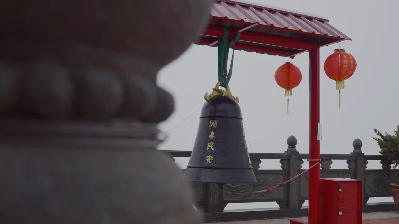 Large Temple Bell on Foggy Mountaintop